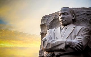 memorial statue of MLK with beautiful sunset sky