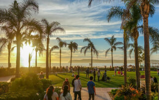 beach in san diego, with people holding celebration of life event